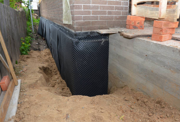 SJ Waterproofing Pros technician performing targeted Vapor Barrier Installation assessment in Spotsylvania, VA